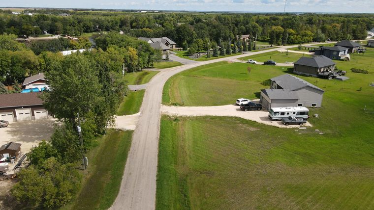 Homes and driveways on the streets running back from the water